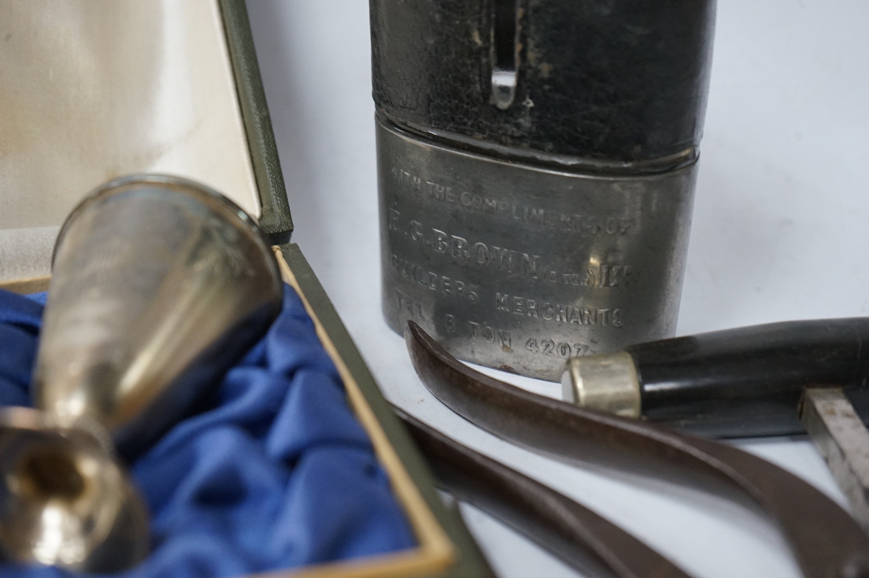 A set of three Soviet white metal cups, boxed, a white metal Torah, a collection of cork screws, a box and collectables. Torah 22cm long. Condition - good to fair